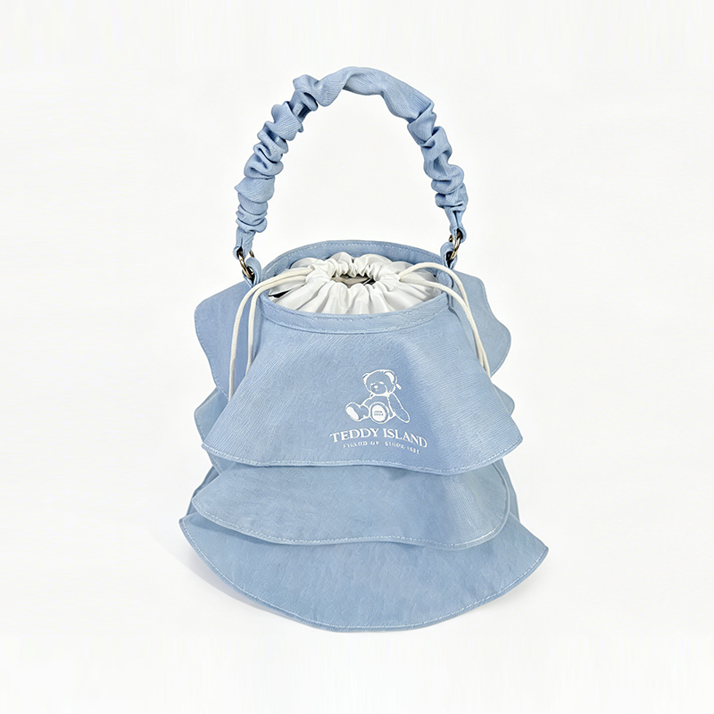 Sac à main en denim Teddy avec jupe à volants